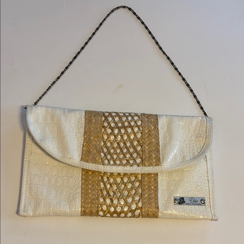 ELSIE…MADE IN THE BAHAMAS WHITE FAUX SKIN CLUTCH WITH STRAW DESIGN SNAP CLOSURE